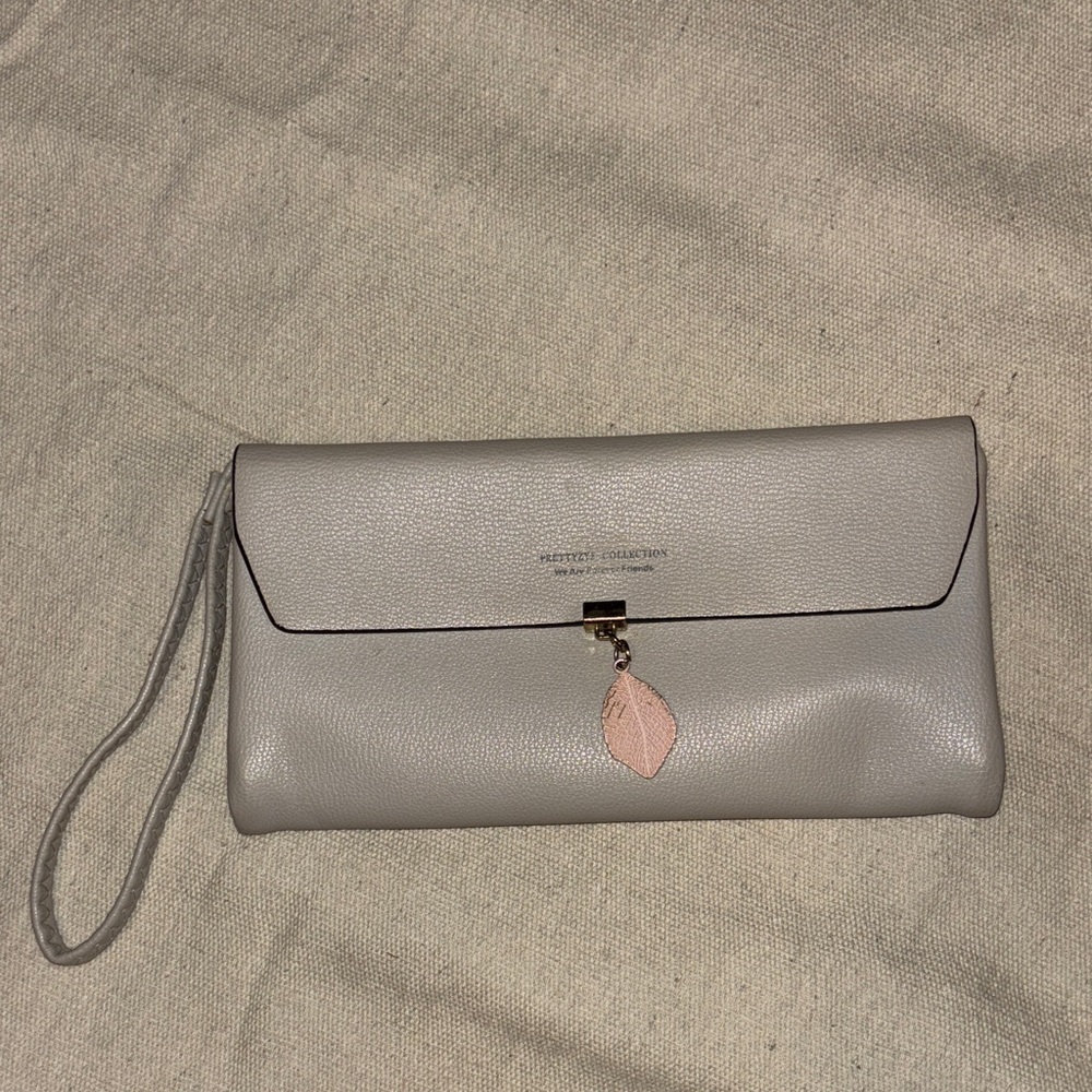 T.J.Maxx Light Gray Wristlet Clutch with Pink Charm